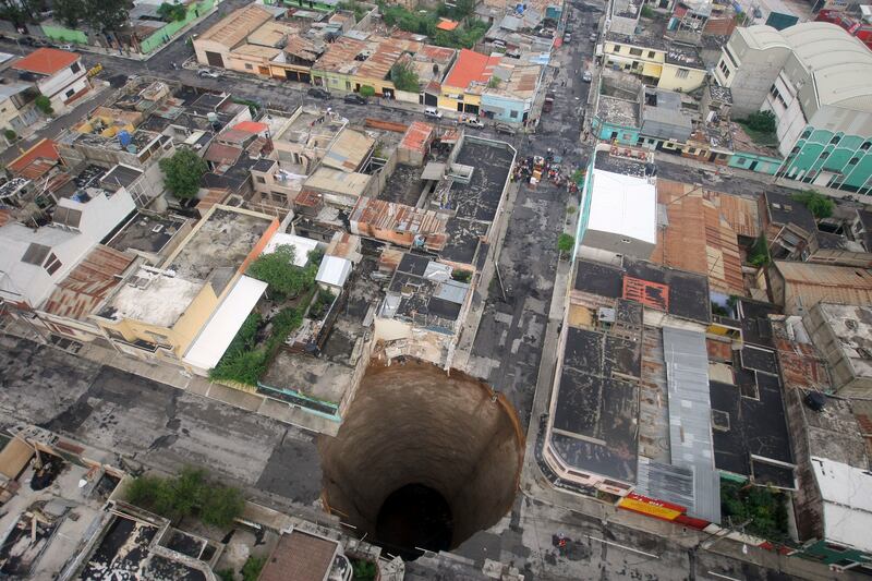 In 2010 a three-storey building dramatically disappeared into a 90-metre-deep sinkhole in Guatemala City. Reuters