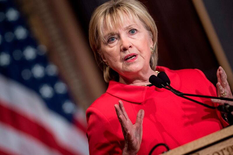 (FILES) In this file photo taken on March 31, 2017 former US Secretary of State Hillary Clinton speaks during an awards ceremony for the Georgetown Institute for Women at Georgetown University on March 31, 2017 in Washington, DC. Hillary Clinton has for the first time ruled out running for president in 2020. "I'm not running, but I'm going to keep on working and speaking and standing up for what I believe," Clinton said March 4, 2019, in an interview with News 12, a local TV channel in New York. Clinton was the frontrunner in 2016 but ended up losing to Donald Trump. / AFP / Brendan Smialowski
