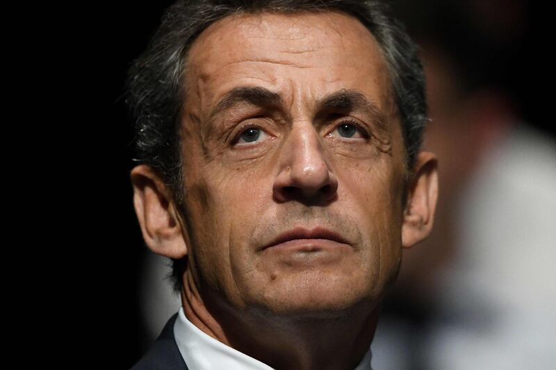 (FILES) In this file photograph taken on October 1, 2016, Nicolas Sarkozy, former French president and France's right-wing Les Republicains (LR - The Republicans) party candidate for the LR primaries ahead of the 2017 presidential election, attends a campaign meeting in Les Sables-d'Olonne, western France. A court will decide on October 8, 2018, on the appeal of Nicolas Sarkozy against the indictment of the national prosecutor's office (PNF) who claimed his trial in the case of "corruption" and "trading in influence" at the Court of Cassation which was revealed by a phone tap. / AFP / JEAN-FRANCOIS MONIER
