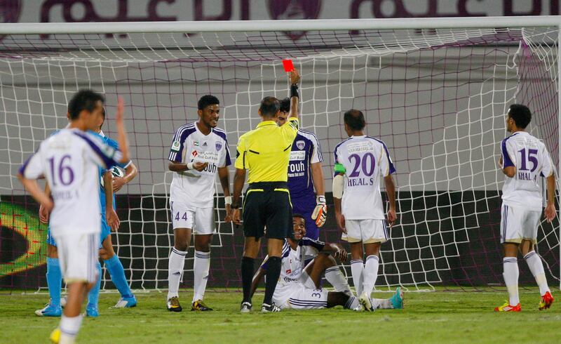 Mohammed Salem of Al Ain is shown a red card during the Etisalat Pro League match between Dibba Al Fujairah and Al Ain at Khalifa bin Zayed Stadium, Al Ain on the 21st October 2012. Credit: Jake Badger for The National


