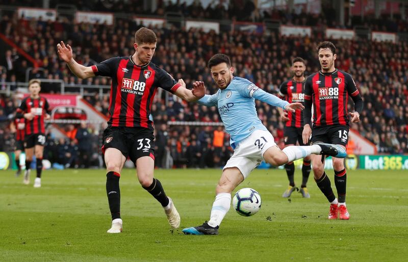 Manchester City's David Silva in action with Bournemouth's Chris Mepham. Action Images via Reuters