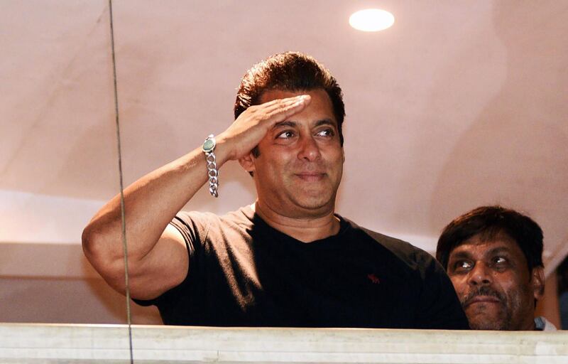 (FILES) In this file photo taken on April 7, 2018, Indian Bollywood actor Salman Khan waves to fans after reaching home at Bandra in Mumbai, following his release from Jodhpur Central jail after an Indian court granted him bail.
In the movies Salman Khan always wins, but offscreen the Bollywood hero has met his match in a 530-year-old Hindu community that puts animals above humans -- especially superstars. The determination of the Bishnoi community forced Khan to spend two sleepless nights in a Rajasthan jail following his conviction last week for killing rare antelopes.
 / AFP PHOTO / Sujit JAISWAL
