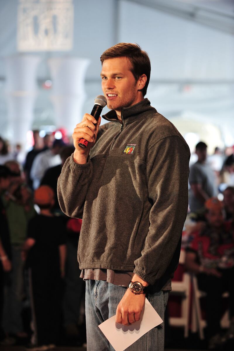 Tom Brady, in a grey Best Buddies fleece, speaks at the The Audi Best Buddies Challenge at Hyannis Port, Massachusetts on May 17, 2008. WireImage