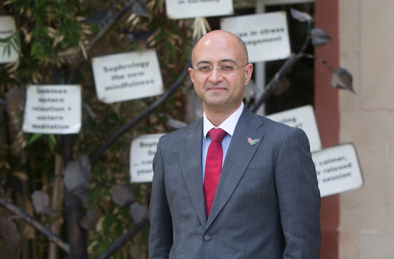 Punit MK Vasu, chief executive of the Indian High School, on the first day of in-person learning.