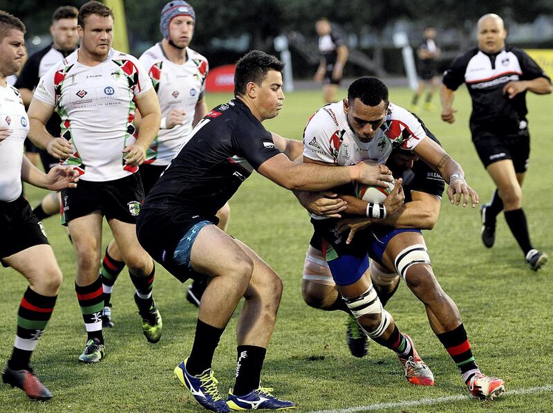 Dubai, April 13, 2018: Dubai Exiles (Black ) vs Abu Dhabi Harlequins (White)  in action during the UAE Premiership finals match at the Rugby Park in Dubai. Satish Kumar for the National / Story by Paul Radley