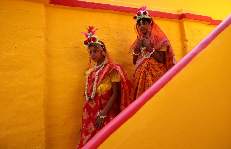 Girls dressed as mythological characters arrive to attend rituals to celebrate Navratri, at the Adyapeath temple on the outskirts of Kolkata. Reuters