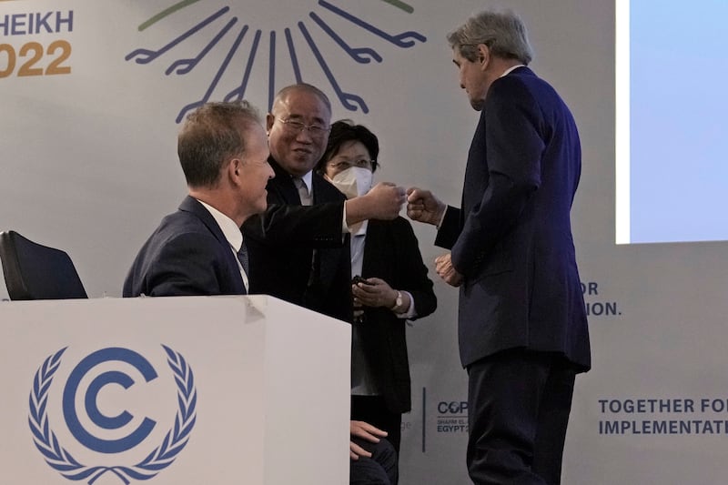 US Special Presidential Envoy for Climate John Kerry, right, and Xie Zhenhua, China's special envoy for climate greet each other at the COP27 UN  Climate Summit in Sharm el-Sheikh, Egypt. AP