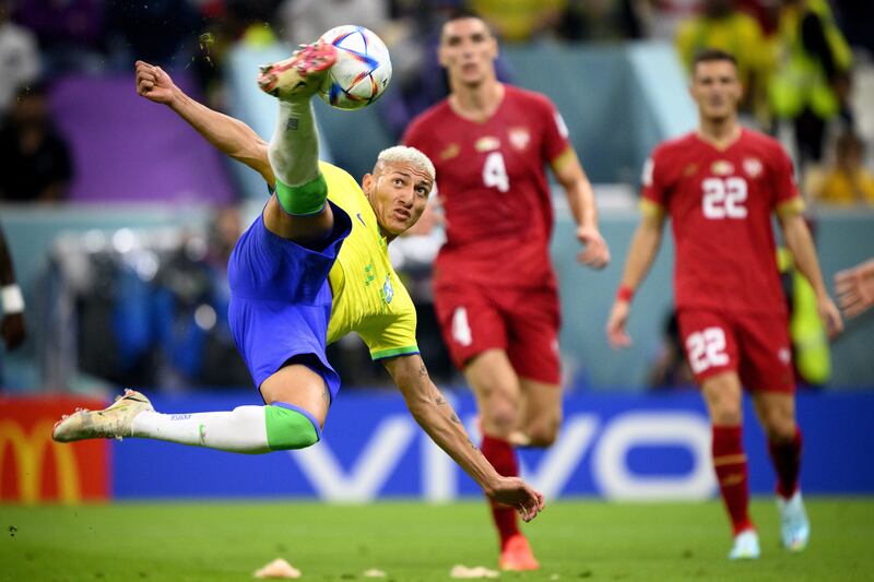 Brazil's Richarlison scores with a bicycle kick in the match against Serbia at Lusail Stadium. EPA