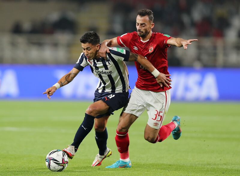 Ahmed Abdel Kader of Al Ahly battles with Arturo Gonzalez of Monterrey. 