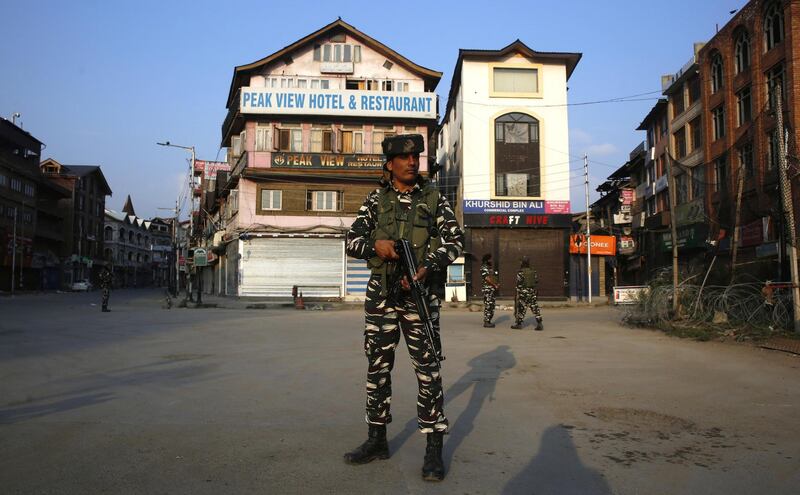 Indian paramilitary soldiers patrol in Srinagar, the summer capital of Indian Kashmir.  EPA