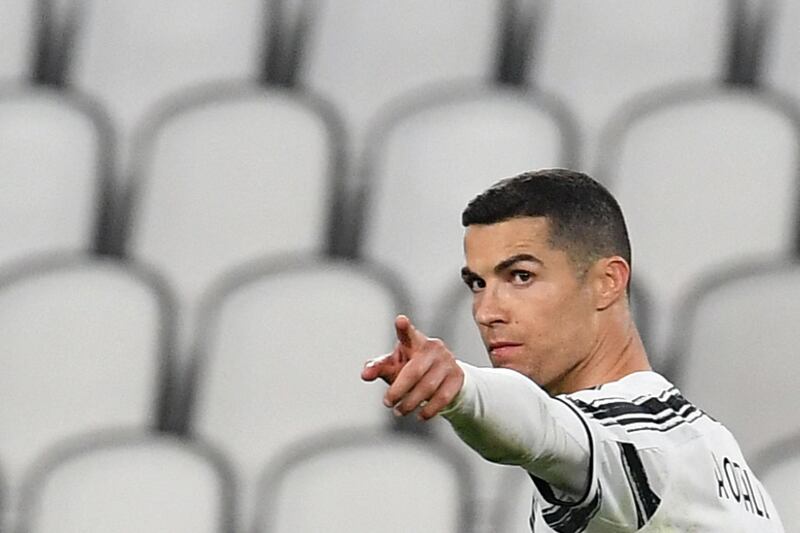 Juventus' Portuguese forward Cristiano Ronaldo celebrates after scoring the third goal during the Italian Serie A football match Juventus vs Spezia on March 02, 2021 at the Juventus stadium in Turin. / AFP / Isabella BONOTTO                    
