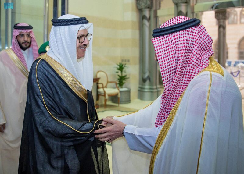 Mr Al Khuraiji welcomes Bahrain's Foreign Minister Abdullatif bin Rashid Al Zayani. AFP 