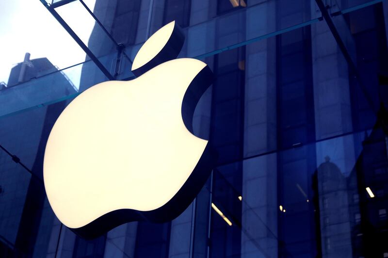 FILE PHOTO: The Apple Inc. logo is seen hanging at the Apple store on 5th Avenue in Manhattan, New York, U.S., October 16, 2019. REUTERS/Mike Segar/File Photo