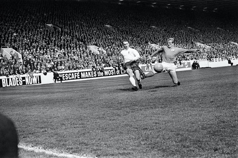 FA Cup Semi Final match at Hillsborough. Tottenham Hotspur 2 v Nottingham Forest 1. Forest midfielder Johnny Barnwell lunges valiantly but ' prevent Jimmy Greaves from delivering a cross during 2-1 FA Cup semi-final victory. Greaves relished facing Forest for the simple reason that usually he found the net against them. During his career he netted 29 times against the Reds, who suffered from his brilliant marksmanship more than any other club, 29th April 1967. (Photo by Ernest Chapman and John Varley/Mirrorpix/Getty Images)
