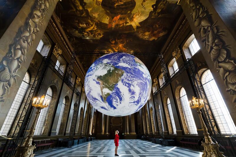 British artist Luke Jerram's 'giant globe' on display at the Royal Naval College in Greenwich, London. Called 'Gaia', it aims to replicate the 'overview effect' that astronauts experience when they see Earth from space. EPA