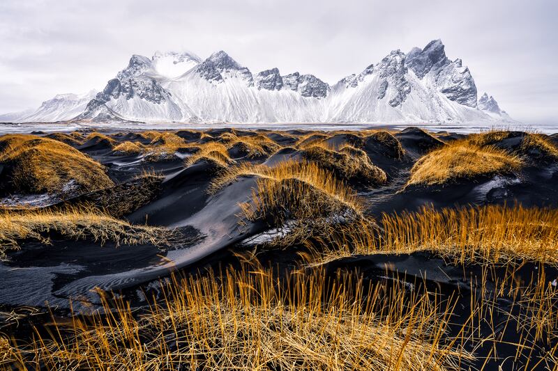 Honourable Mention - Landscape, Ivan Pedretti, Italy. Winter in Stokksnes on the beach with black sand and the majestic Vestrahorn mountain.