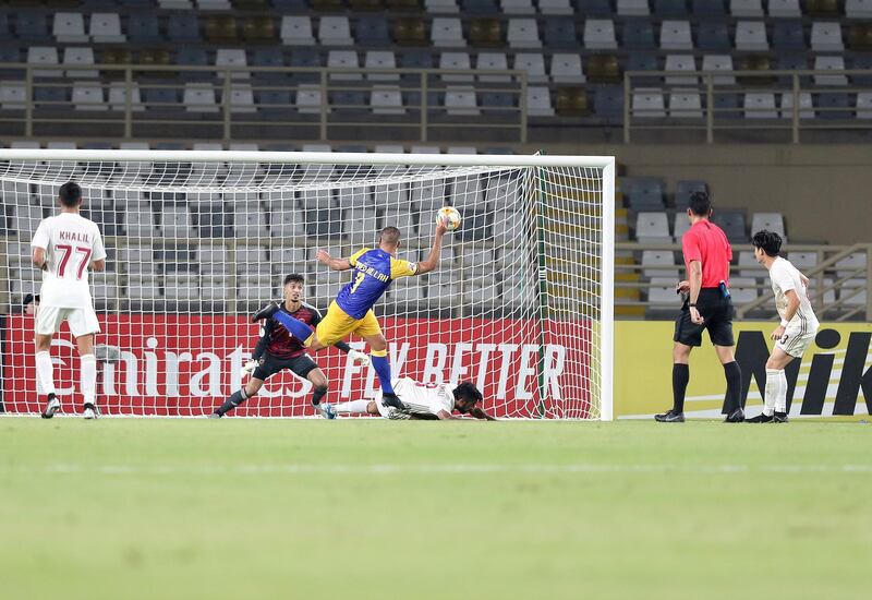 Abu Dhabi, United Arab Emirates - August 12, 2019: Abderrazak Hamdallah of Al Nassr scores during the Asian Champions League round 16 return leg between Al Wahda of the UAE and Al Nassr of Saudi Arabia. Monday the 12th of August 2019. Al Wadha, Abu Dhabi. Chris Whiteoak / The National