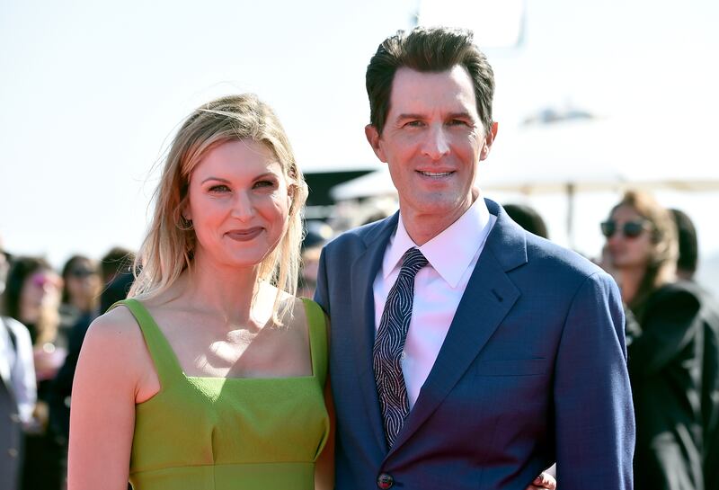 Director Joseph Kosinski, right, and Kristin Kosinski arrive at the world premiere of 'Top Gun: Maverick'. Jordan Strauss / Invision / AP