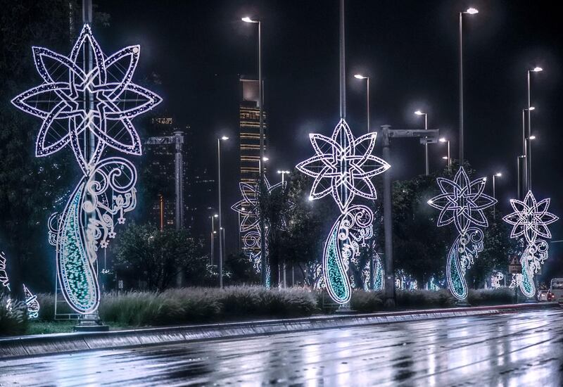 Abu Dhabi, United Arab Emirates, April 15, 2020.  The newly installed Ramadan lights on the Corniche during the rains.
Victor Besa / The National
Section:  NA
For:  Standalone/Stock Images