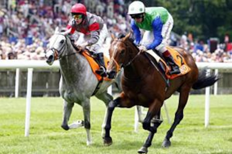 Arcano, pictured winning the July Stakes at Newmarket, is favourite for the 2000 Guineas.