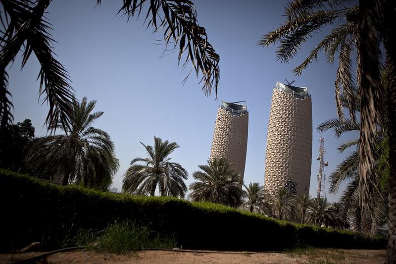 The twin 29-storey Al Bahr Towers use a solar shading system that features a computer-controlled facade made up of thousands of translucent units.  Razgova / The National