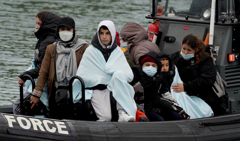 Young migrants sail into Dover on May 23, 2022. PA