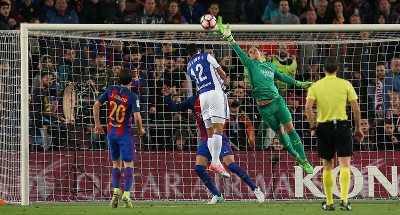 Barcelona goalkeeper Marc-Andre Ter Stegen blocks a ball. Albert Gea / Reuters