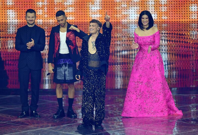 Hosts Italian television and radio presenter Alessandro Cattelan and singer Laura Pausini with Italian singers Blanco and Mahmood on stage. EPA