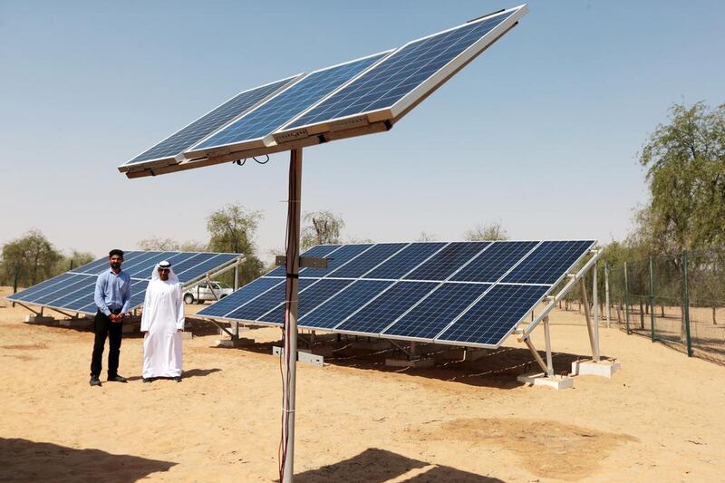 Solar panels in the Khab Al Dhas forest in the Western Region. Christopher Pike / The National