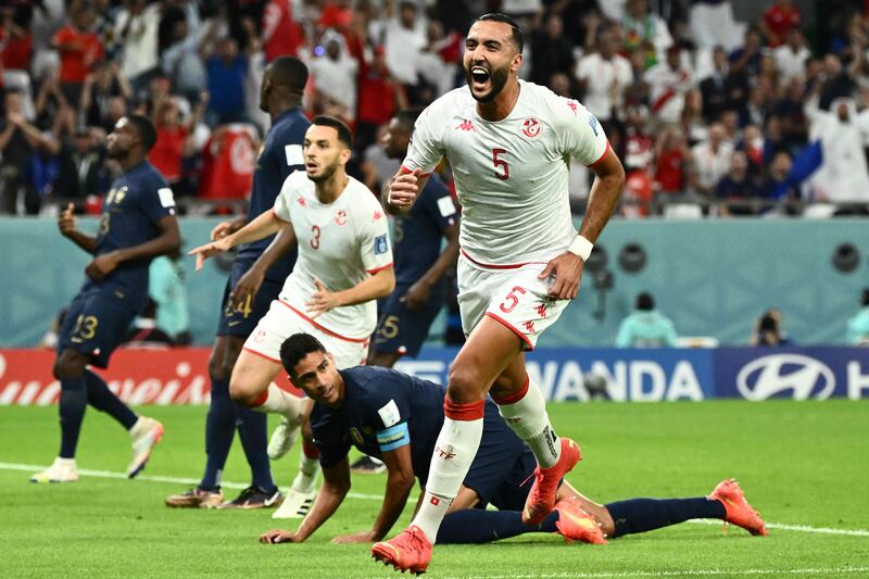 Tunisia's Nader Ghandri celebrates scoring a goal against France that was flagged offside. AFP