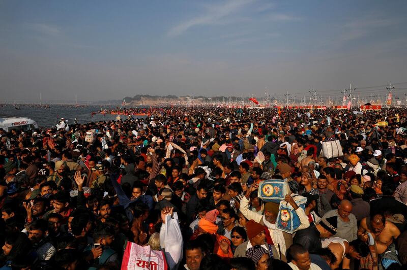 Devotees arrive to take a dip during the first 'Shahi Snan' (grand bath) at 'Kumbh Mela' or the Pitcher Festival, in Prayagraj, previously known as Allahabad, India, January 15, 2019. REUTERS/Danish Siddiqui