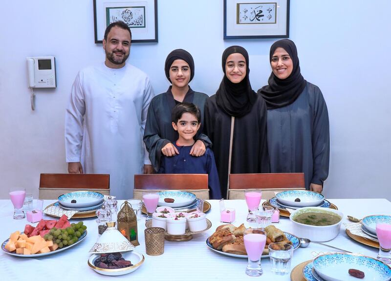 Dubai, U.A.E., June 4, 2018.  Fathima Mansoor Ahmed prepares iftar for her family.  (L-R) Maseeh, Maryam-11, Zahraa-14, Fathima, Muhammad-7.
Victor Besa / The National
Reporter:  Hala Khalaf 
Section:  Arts & Life