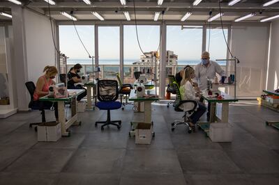 Women attend training at the Diamony Group academy on the factory floor of the headquarters in Kaslik, Lebanon. Oliver Marsden for The National