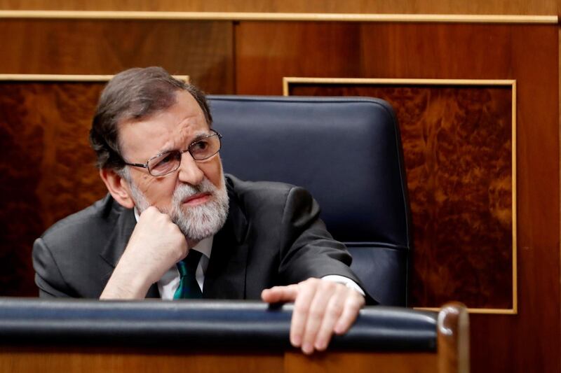 epa06774768 Spanish Prime Minister, Mariano Rajoy, reacts during the no-confidence motion vote against him at the Parliament, in Madrid, Spain, 31 May 2018. Leader of Spanish Socialist Party (PSOE), Pedro Sanchez, filed the motion last Friday a day after former PP officials were found guilty in the so-called Guertel corruption trial. Sanchez's motion needs to be backed in the two-day debate with half plus one of the 350 deputies' votes to be successful. If so and Sanchez gets the support from other parties, with Basque PNV party's ones absolutely indispensable, he would unseat Rajoy and call snap elections in a future date to be agreed on by the opposition parties. This one is the second confidence vote thant Rajoy faces in a year.  EPA/JAVIER LIZON