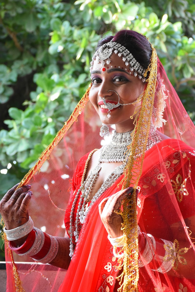 Kshama Bindu during her solo wedding ceremony at her home in Vadodara, in Gujarat state, India. Bindu’s wedding is being described by Indian media as the country’s first case of 'sologamy', a rare symbolic wedding ceremony where people marry themselves. AP