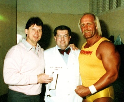 From left: Vince McMahon, Dr George T Zahorian III and wrestler Hulk Hogan in 1988. AP Photo