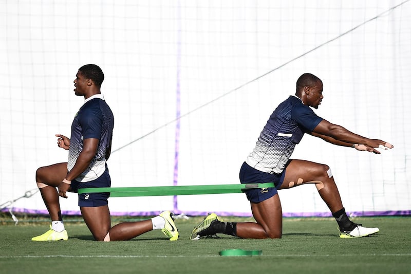 South Africa's full back Warrick Gelant (L) South Africa's wing Makazole Mapimpi take  part in a training session at Omaezaki Nexta Field in Shizuoka, during the Japan 2019 Rugby World Cup. AFP