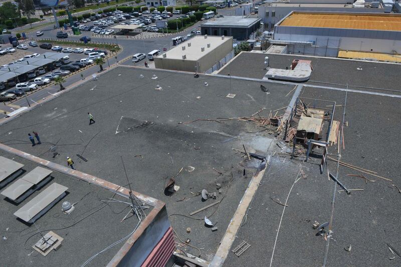 The damage on the roof of Abha airport.  AFP