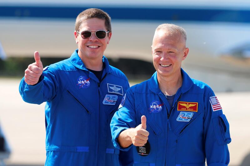 NASA astronauts Bob Behnken and Doug Hurley arrive at the Kennedy Space Center to prepare for the launch of SpaceX's Crew Dragon capsule, at Cape Canaveral, Florida, U.S. May 20, 2020. REUTERS/Joe Skipper     TPX IMAGES OF THE DAY