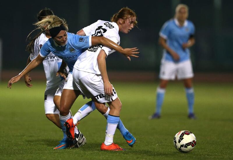 Toni Duggan of Manchester City Women’s FC is tackled by Beatice Goad of Melbourne City Women’s FC during the Fatima Bint Mubarak Ladies Sports Academy Challenge between Melbourne City Women and Manchester City Women at New York University Abu Dhabi Campus on February 17, 2016 in Abu Dhabi, United Arab Emirates. Warren Little/Getty Images