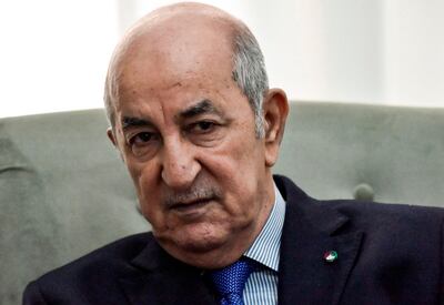 (FILES) This file photo taken on January 21, 2020 shows Algerian President Abdelmadjid Tebboune during a meeting with visiting French foreign minister in the capital Algiers. Algeria's President Abdelmadjid Tebboune has returned to Germany for post COVID-19 treatment, Algeria announced on January 10, 2021. / AFP / RYAD KRAMDI                         
