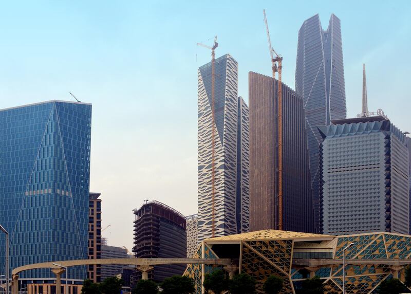 Riyadh, Saudi Arabia: King Abdullah Financial District (KAFD) - left to right, 3.04 office tower, KAFD World Trade Center, GCC Bank Headquarters, Public Investment Fund (PIF) Tower (the tallest building), Samba Bank tower. KAFD Conference Center can be seen on the lower right, crossed by the viaduct of the monorail - Al Aqeeq - ad-Diriyah. Getty Images