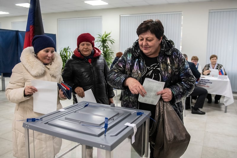 Women vote at a polling station in the Russian-controlled Donetsk region of Ukraine. AP