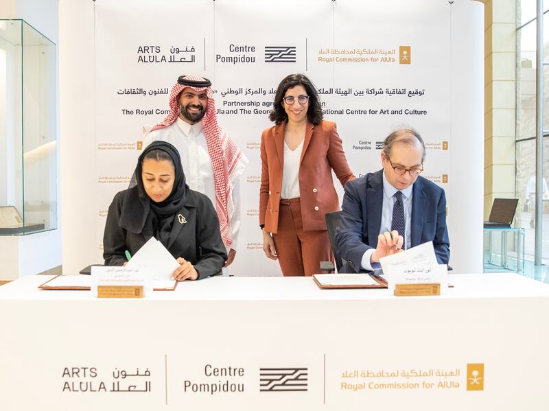 Arts AlUla executive director Nora Aldabal signs an agreement with Centre Pompidou president Laurent Le Bon, with Prince Badr bin Farhan, Saudi Minister of Culture and Governor of the Royal Commission for AlUla, and French Culture Minister Rima Abdul Malak in attendance. Photo: Royal Commission for AlUla