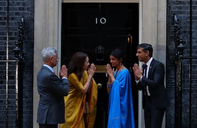 From left, Indian External Affairs Minister Subrahmanyam Jaishankar, his wife Kyoko, Akshata Murty and her husband, UK Prime Minister Rishi Sunak, outside No 10 Downing Street, London. Reuters