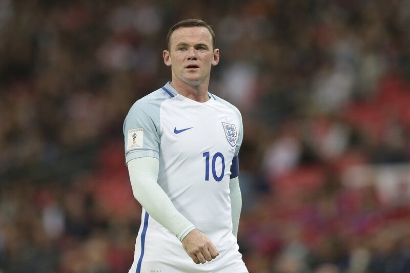 England's Wayne Rooney has been dropped to the bench for the World Cup qualifier against Slovenia. Tim Ireland / AP Photo 