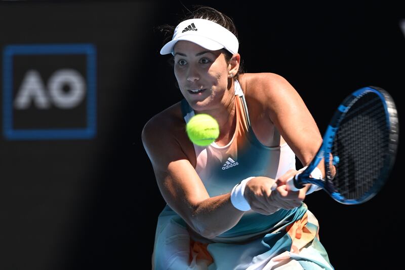 Garbine Muguruza of Spain returns to Alize Cornet of France in their second round match at the Australian Open in Melbourne. EPA