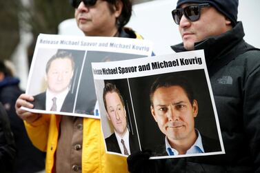 Protesters call for China to release Canadian detainees Michael Spavor and Michael Kovrig during an extradition hearing for Huawei Chief Financial Officer Meng Wanzhou at the BC Supreme Court in Vancouver, Canada on March 6, 2019. Reuters