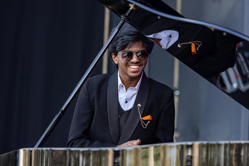 Pianist Lydian Nadhaswaram looks like he is enjoying performing with the Firdaus Orchestra at the Jubilee Stage.