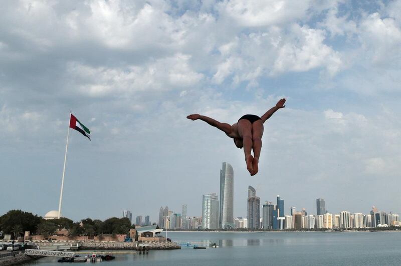 Sasha Kutsenko of Ukraine competes during the final of the Fina High Diving World Cup on the breakwater along the Corniche in Abu Dhabi on February 29, 2016. Christopher Pike / The National